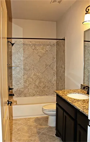 a view of a door and a window