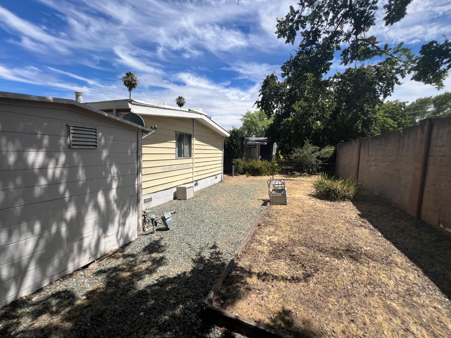 167 Rimma Way Roseville, CA 95661 - Photo 18 of 22 a view of a house with a yard