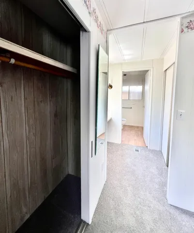 a view of a bathroom with a glass door