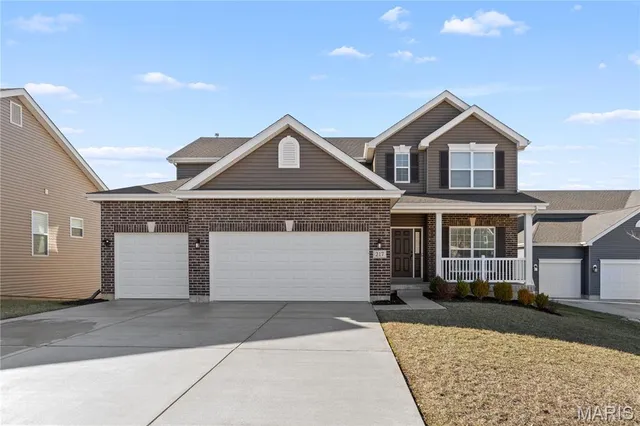 $489,900 | 217 Hidden Bluffs Drive, Lake St. Louis, MO 63367
