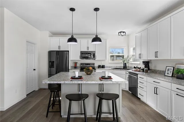 $489,900 | 217 Hidden Bluffs Drive, Lake St. Louis, MO 63367