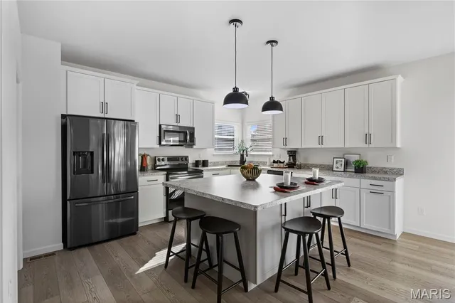 $489,900 | 217 Hidden Bluffs Drive, Lake St. Louis, MO 63367