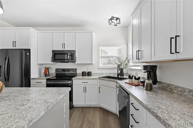 $489,900 | 217 Hidden Bluffs Drive, Lake St. Louis, MO 63367