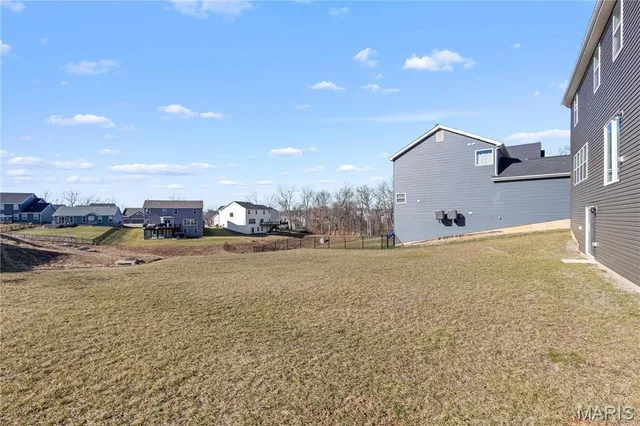 $489,900 | 217 Hidden Bluffs Drive, Lake St. Louis, MO 63367