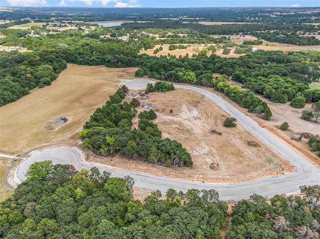 Lot 8 Cedar Springs Drive Decatur, TX 76234 - Photo 5 of 19 an aerial view of a houses with a yard