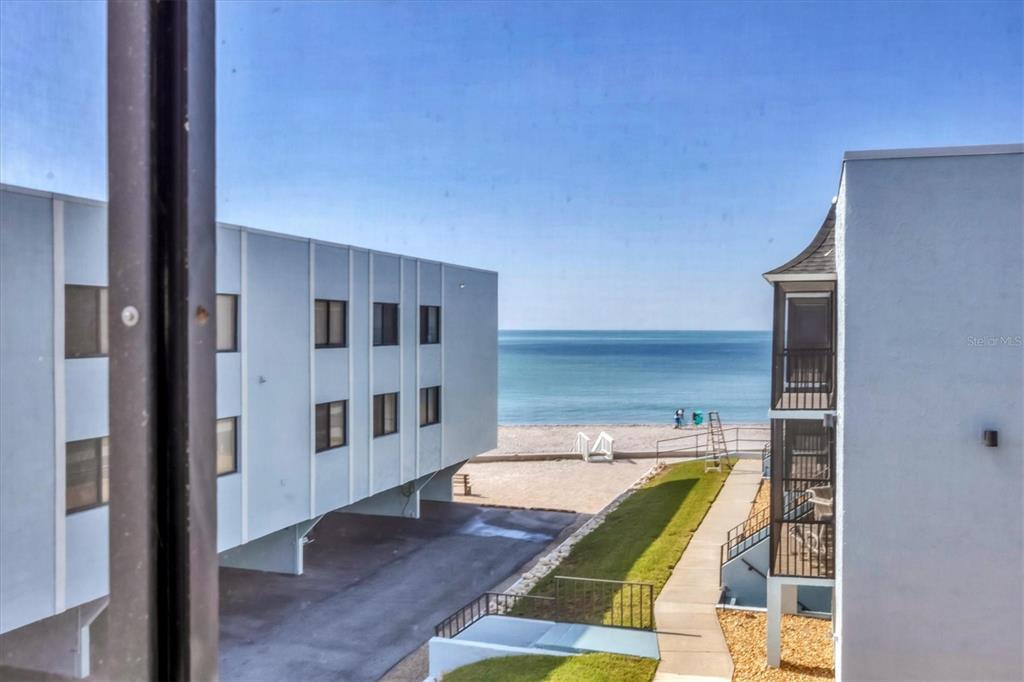 2810 North Beach Road, Unit D205 Englewood, FL 34223 - Photo 17 of 48 a view of swimming pool from a balcony