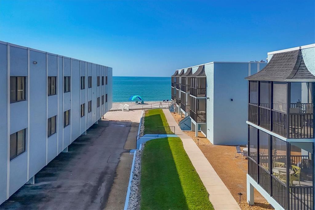 2810 North Beach Road, Unit D205 Englewood, FL 34223 - Photo 2 of 48 a view of a house with backyard