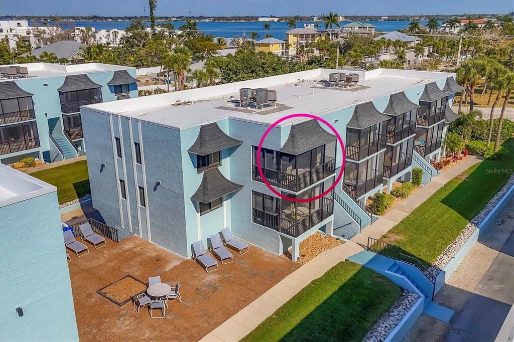 2810 North Beach Road, Unit D205 Englewood, FL 34223 - Photo 40 of 48 an outdoor space with furniture