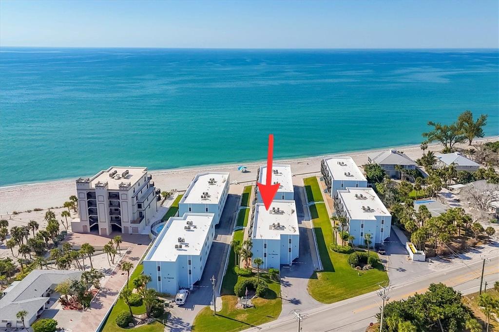 2810 North Beach Road, Unit D205 Englewood, FL 34223 - Photo 6 of 48 an aerial view of multiple houses with outdoor space