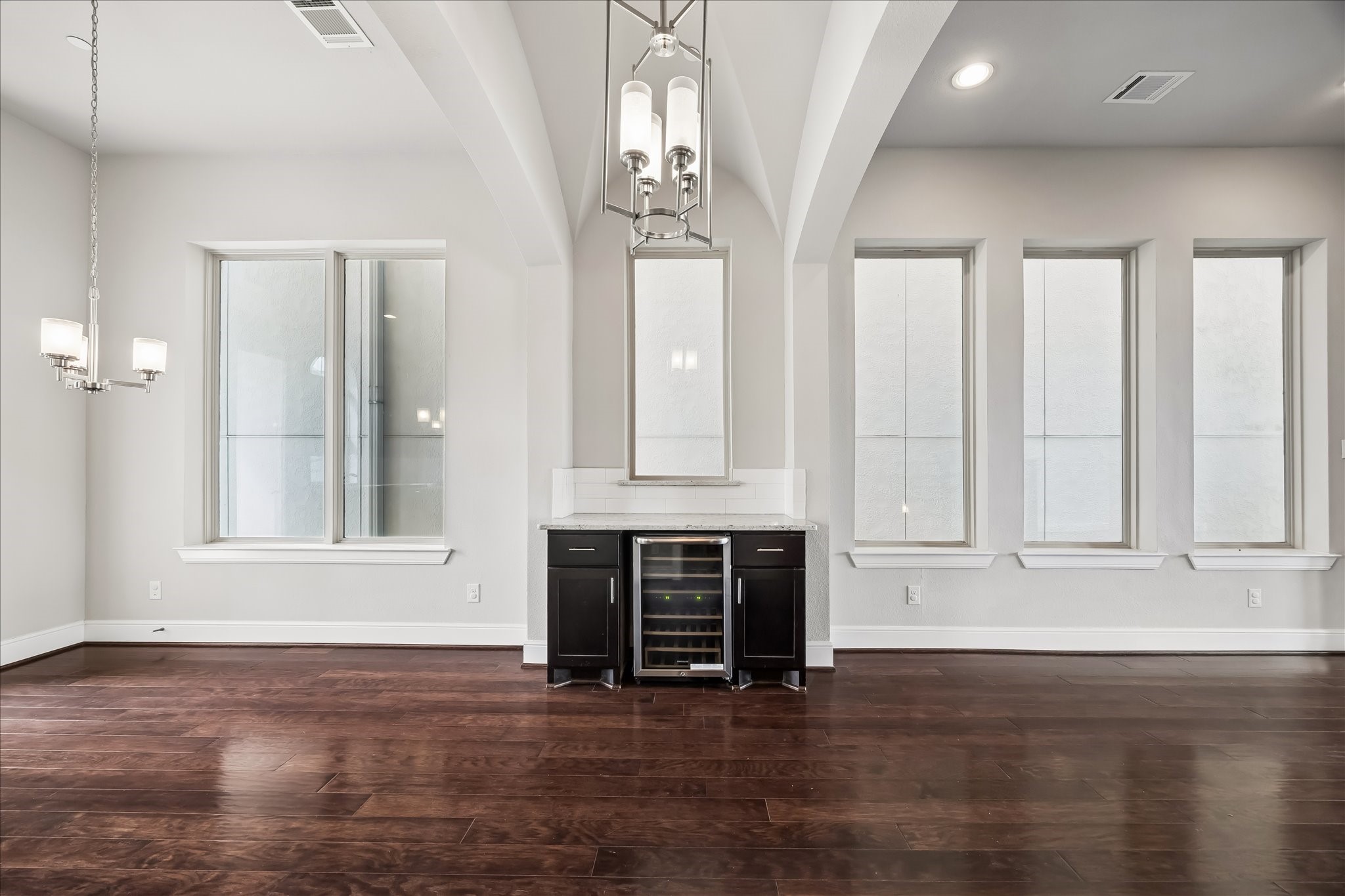 4016 Barnes Street Houston, TX 77007 - Photo 17 of 37 a view of an empty room with a window and fireplace