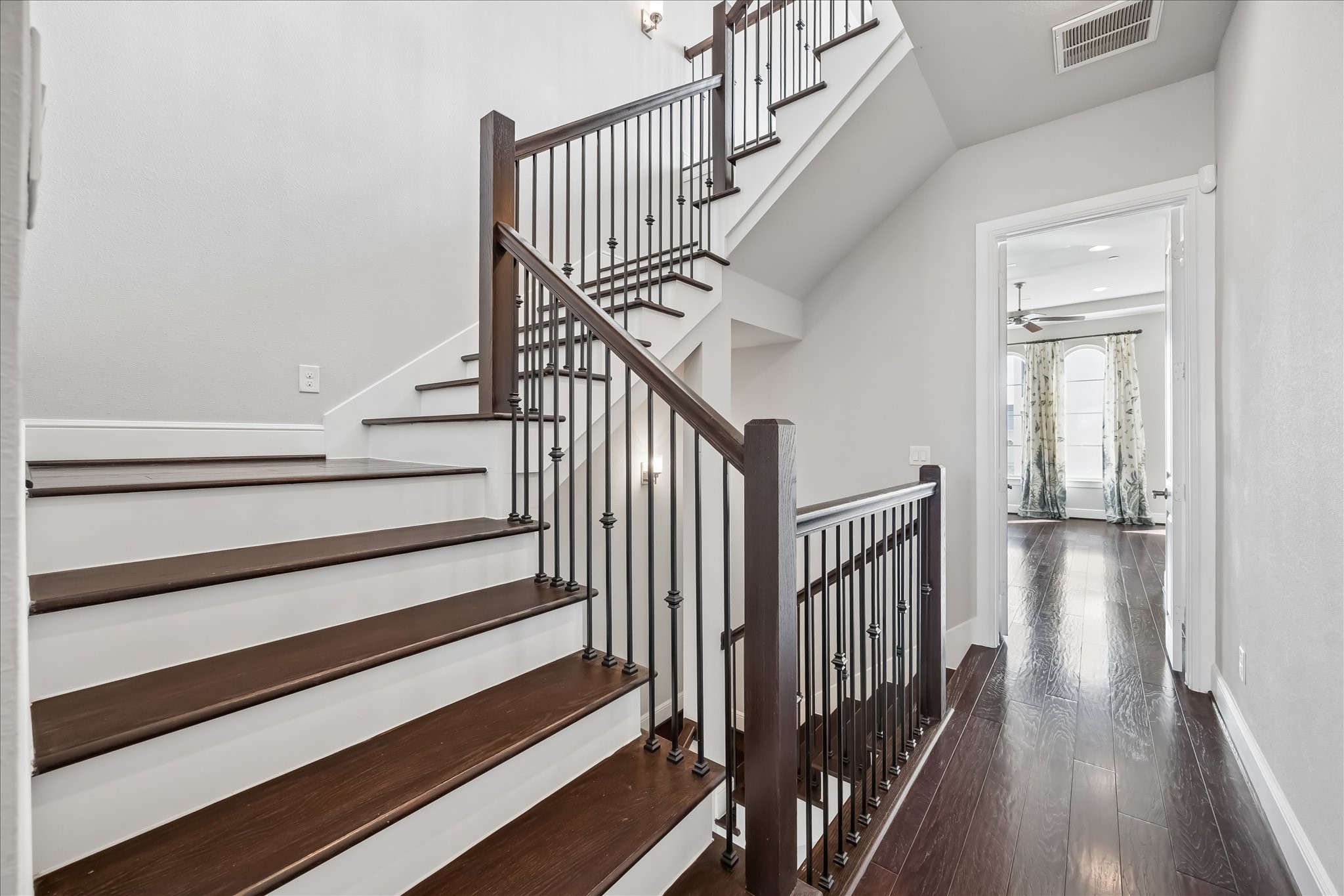 4016 Barnes Street Houston, TX 77007 - Photo 23 of 37 a view of entryway with wooden floor and stairs