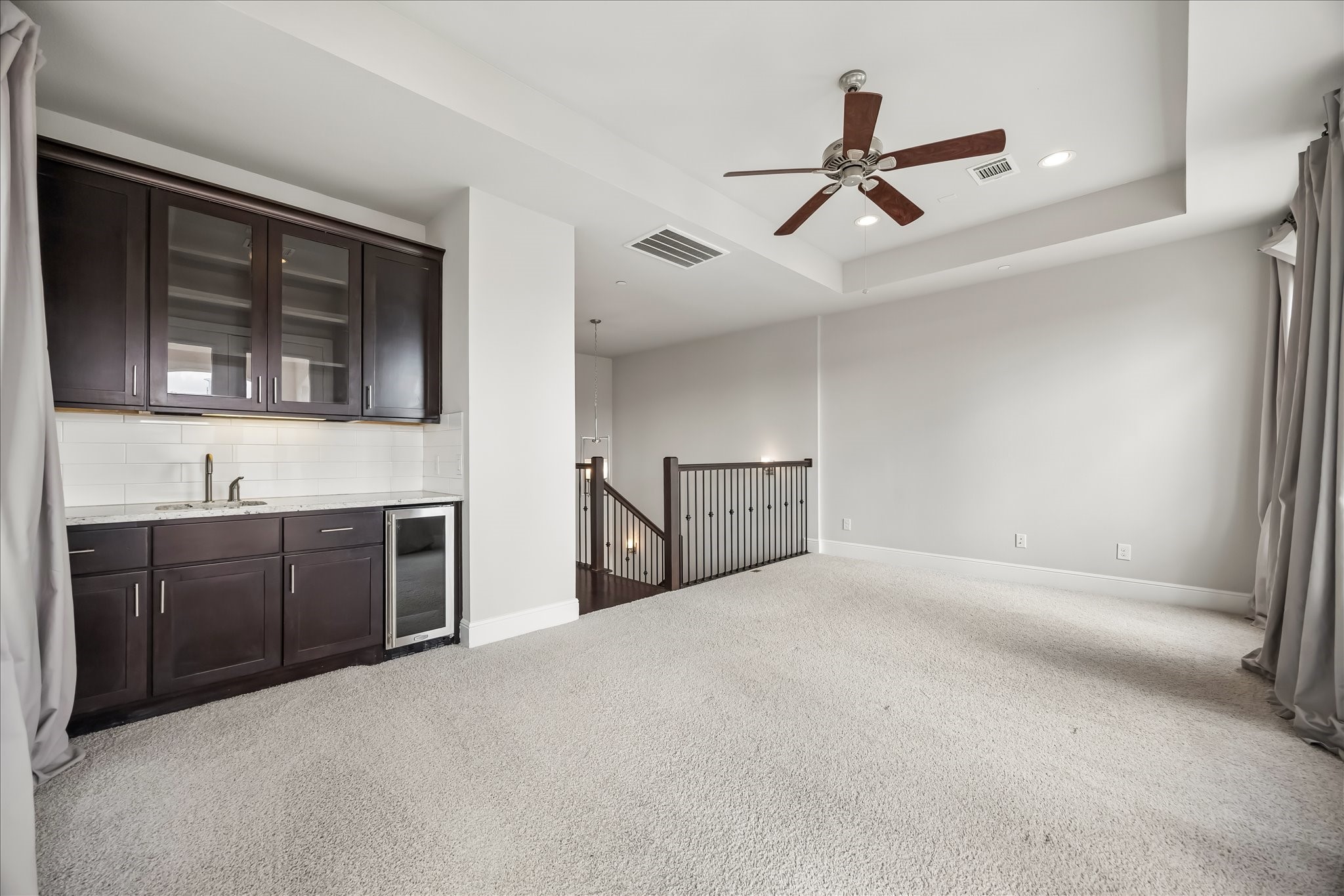 4016 Barnes Street Houston, TX 77007 - Photo 31 of 37 a living room with stainless steel appliances kitchen island granite countertop a sink and cabinets