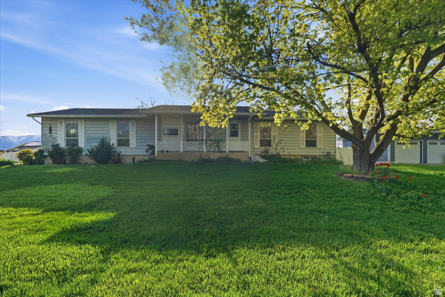 1095 Park Avenue Logan, UT 84321 - Photo 27 of 27 Front of house with a lawn