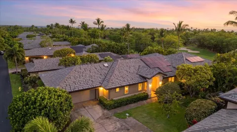 a view of a houses with a yard