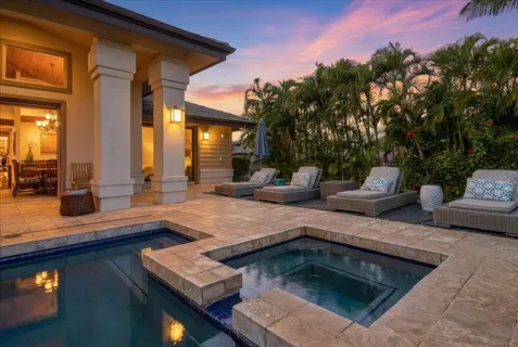 a view of a patio with swimming pool table and chairs