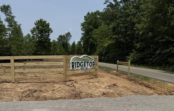 a sign that is on the side of a road