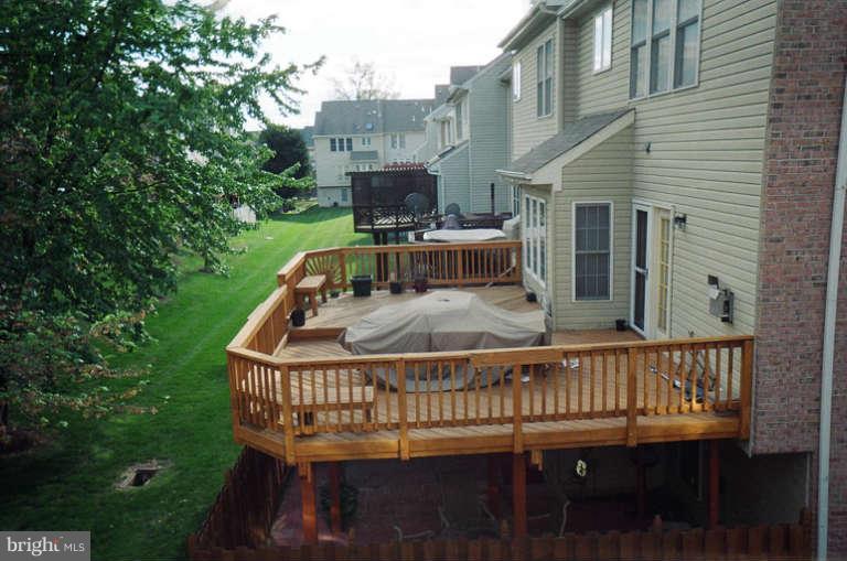 8 Chippewa Court Silver Spring, MD 20906 - Photo 11 of 30 a view of a chair and table in the balcony