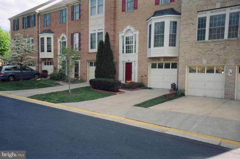 8 Chippewa Court Silver Spring, MD 20906 - Photo 15 of 30 a view of a brick building next to a yard