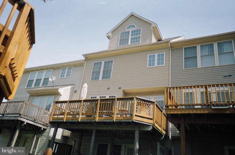 8 Chippewa Court Silver Spring, MD 20906 - Photo 27 of 30 a view of a house with a balcony and deck