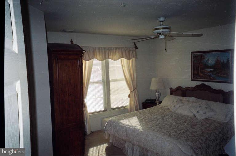 8 Chippewa Court Silver Spring, MD 20906 - Photo 7 of 30 a bedroom with a bed and a window