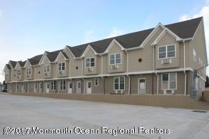 33 Vanderbilt Avenue, Unit 13 Leonardo, NJ 07737 - Photo 1 of 7 a view of houses with a small yard