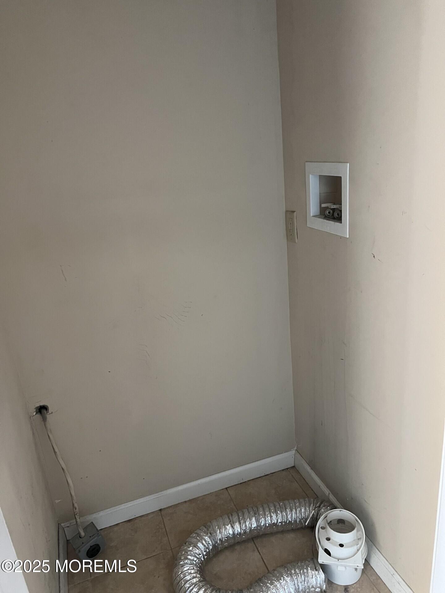 33 Vanderbilt Avenue, Unit 13 Leonardo, NJ 07737 - Photo 6 of 7 a view of room with empty racks