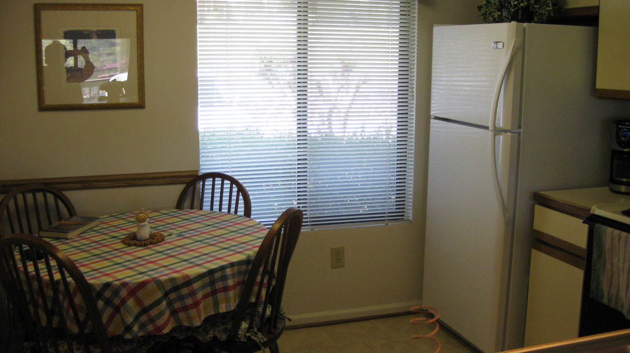 403 Harbor Ridge Drive Goodview, VA 24095 - Photo 5 of 11 a dining room with furniture and window