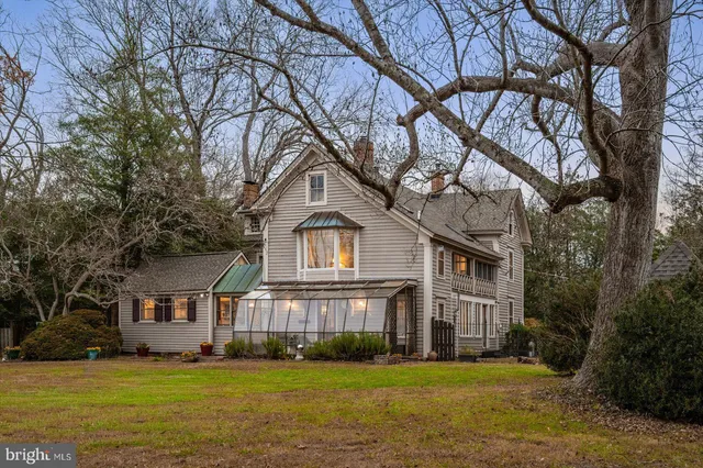 a kitchen with stainless steel appliances granite countertop a stove and cabinets