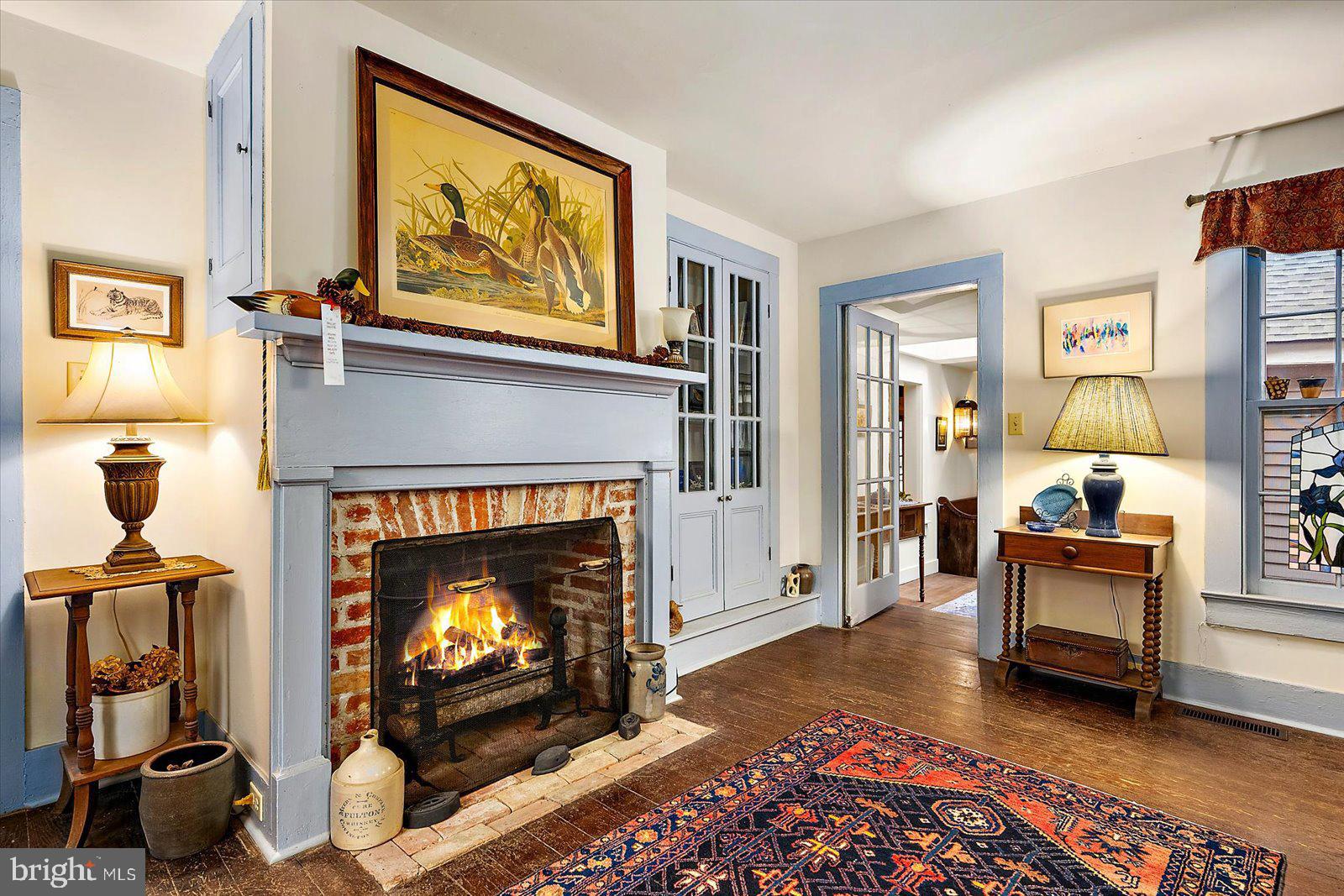 27947 Fairmount Road Westover, MD 21871 - Photo 60 of 122 a living room with furniture and a fireplace