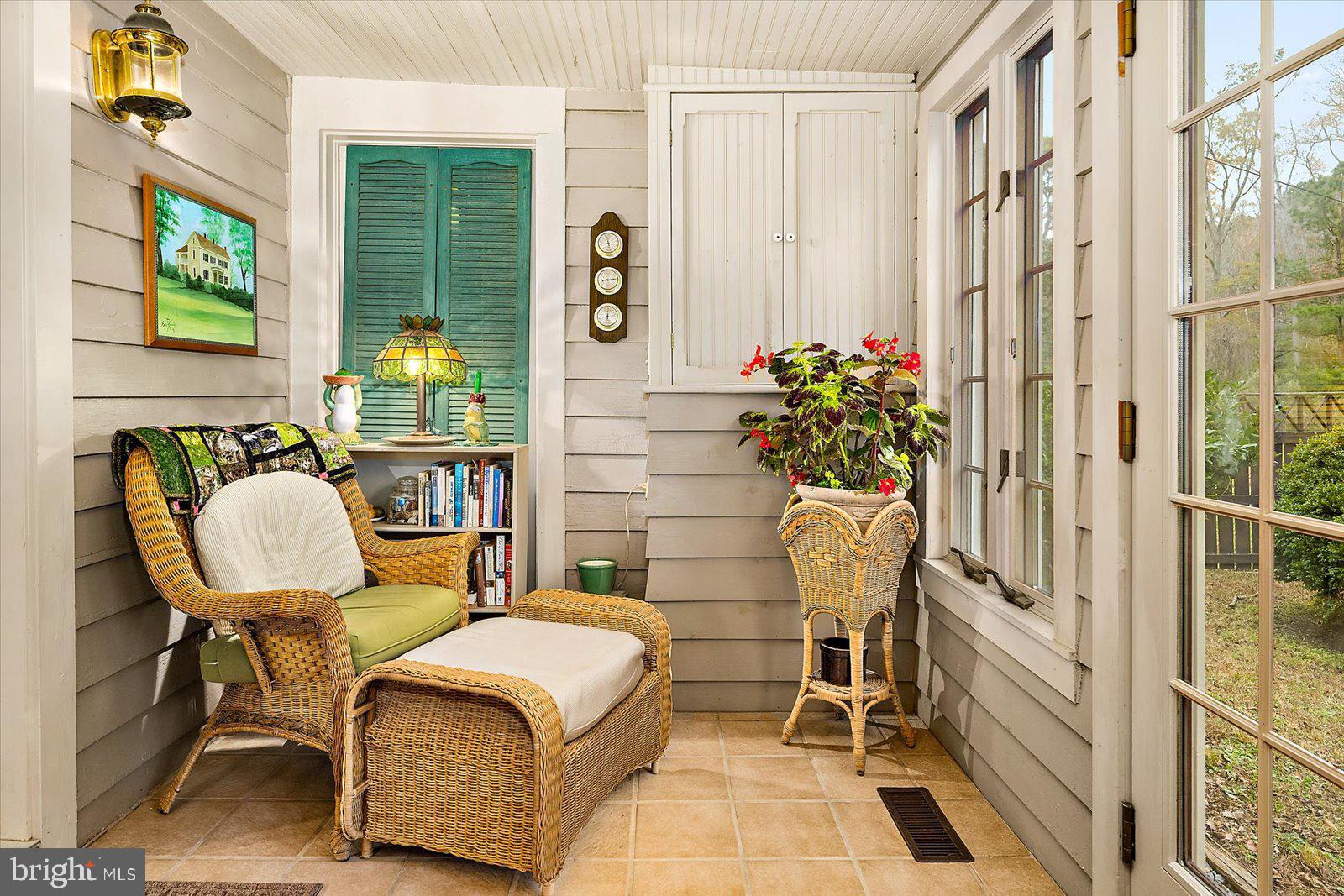 27947 Fairmount Road Westover, MD 21871 - Photo 84 of 122 a balcony with table and chairs