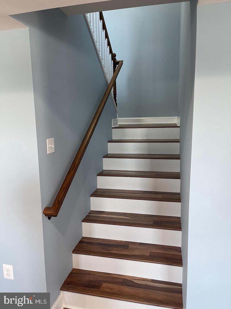 6303 Field Street Capitol Heights, MD 20743 - Photo 11 of 27 Head up the stairs to 4 ensuite bedrooms