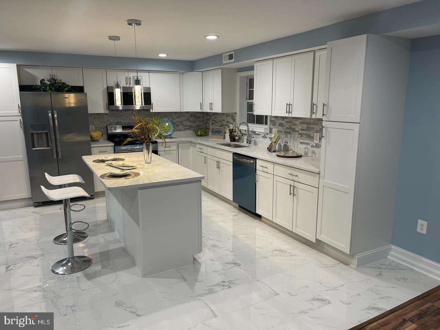 6303 Field Street Capitol Heights, MD 20743 - Photo 8 of 27 Spacious kitchen island with seating