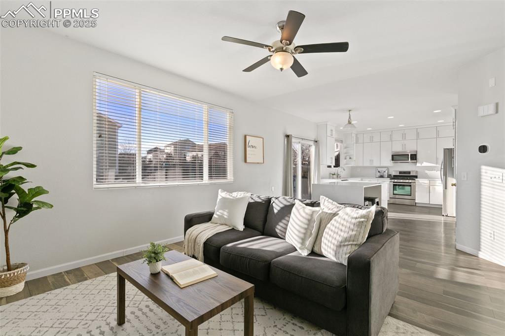 9202 Ballybunion Road Peyton, CO 80831 - Photo 19 of 36 a living room with furniture and a window