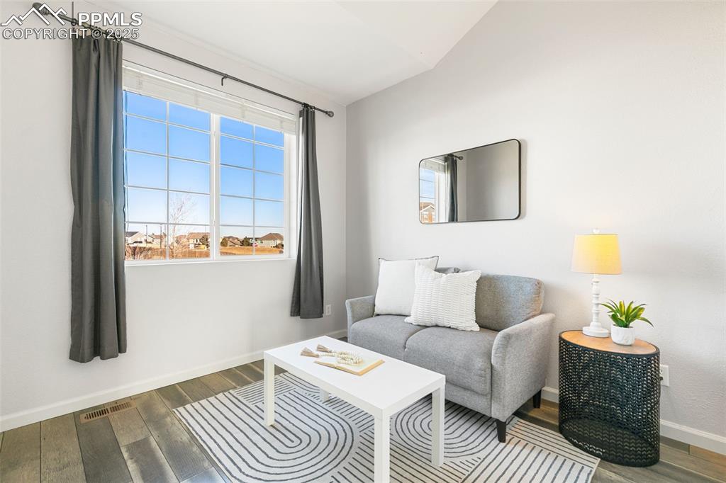 9202 Ballybunion Road Peyton, CO 80831 - Photo 4 of 36 a living room with furniture and a window
