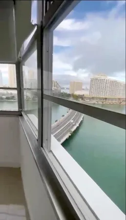 a view of a kitchen with a window