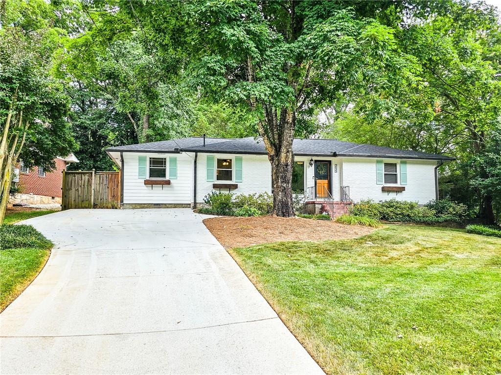 2635 Harrington Drive Decatur, GA 30033 - Photo 1 of 1 a front view of house with yard and green space