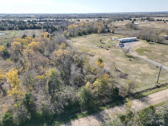 a view of a lake with beach and mountain view