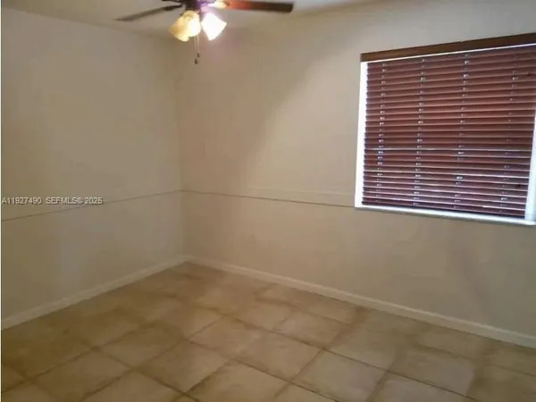 a view of a small space with racks on the wall