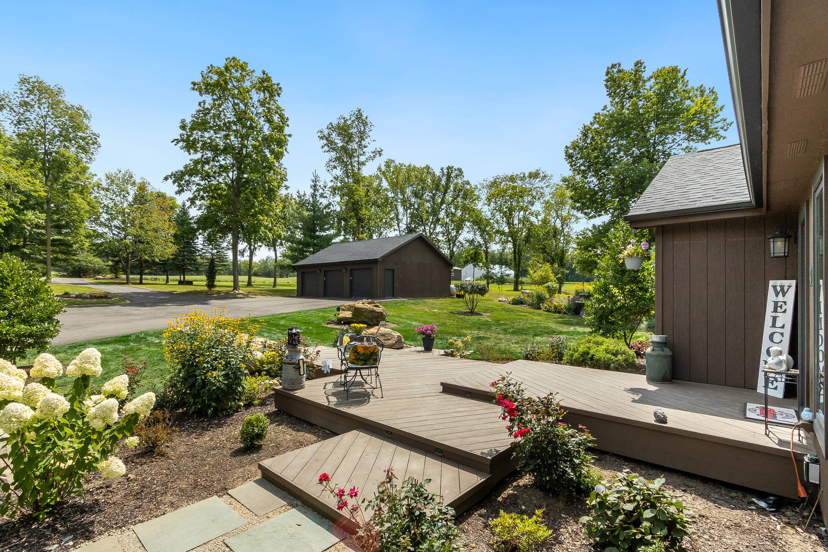 911.5 Melugins Grove Road Compton, IL 61318 - Photo 5 of 47 a view of a chairs and table in the garden