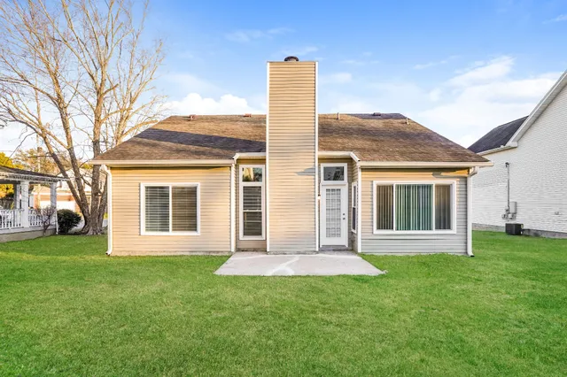 front view of house with a yard