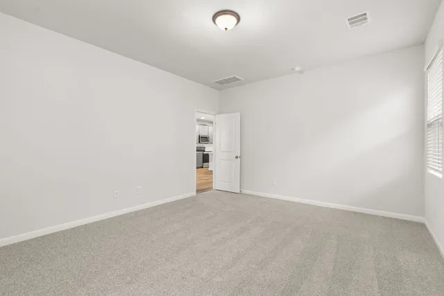 a bathroom with a sink a vanity and a mirror