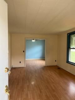 231 Gay Street Erwin, TN 37650 - Photo 3 of 7 an empty room with windows