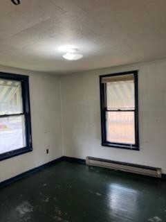 231 Gay Street Erwin, TN 37650 - Photo 4 of 7 an empty room with a window