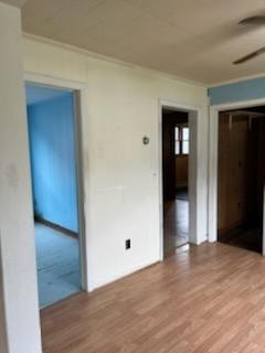231 Gay Street Erwin, TN 37650 - Photo 6 of 7 an empty room with wooden floor and closet