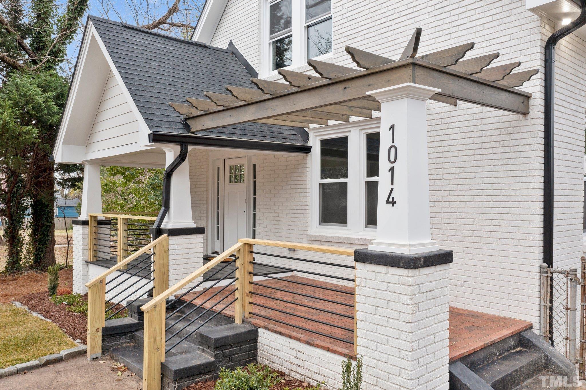 1014 South Person Street Raleigh, NC 27601 - Photo 4 of 48 a front view of house with a garden