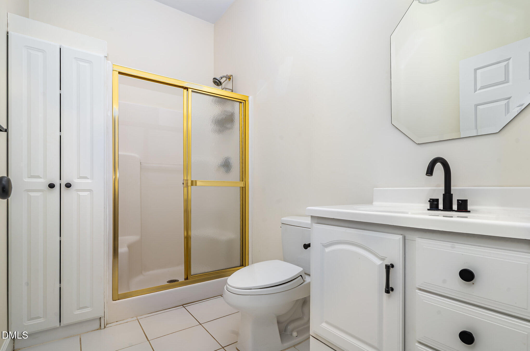 9036 Sundance Street Wake Forest, NC 27587 - Photo 16 of 22 a bathroom with a sink a toilet and shower