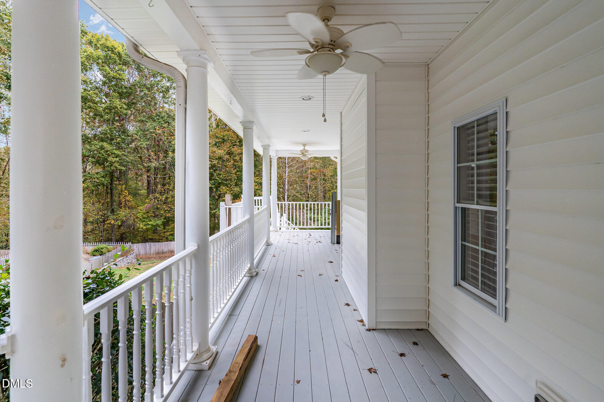 9036 Sundance Street Wake Forest, NC 27587 - Photo 18 of 22 a view of a room with wooden floor fan and windows