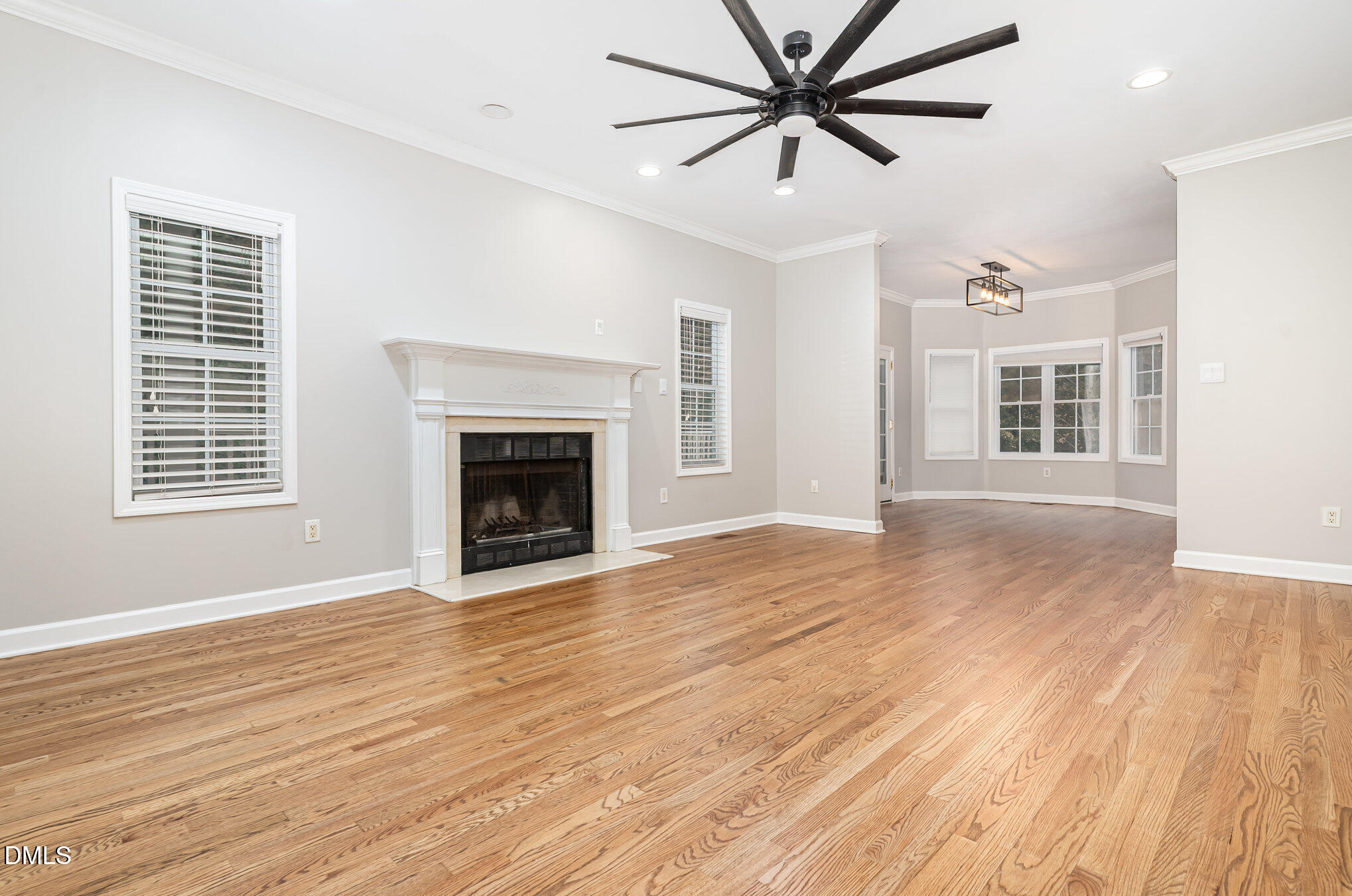9036 Sundance Street Wake Forest, NC 27587 - Photo 4 of 22 a view of a livingroom with a ceiling fan and window