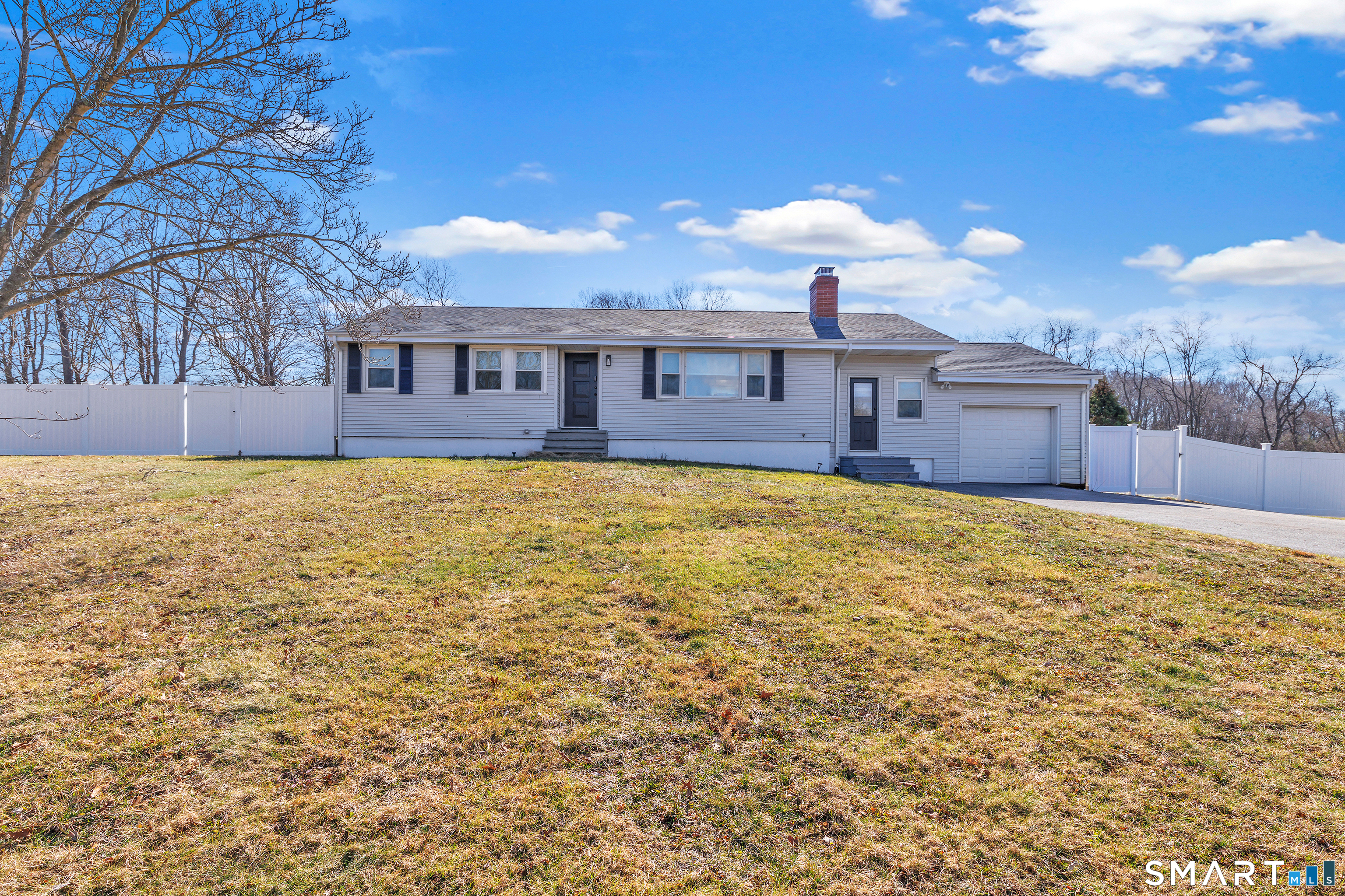 337 Thompson Street East Haven, CT 06513 - Photo 1 of 1 a view of a house with a yard