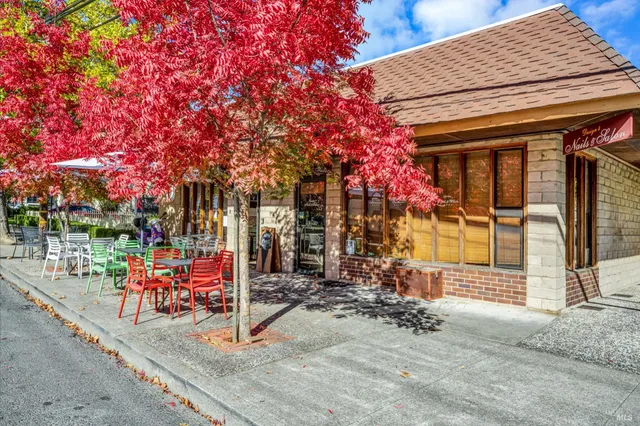 a view of a car park in front of a brick house